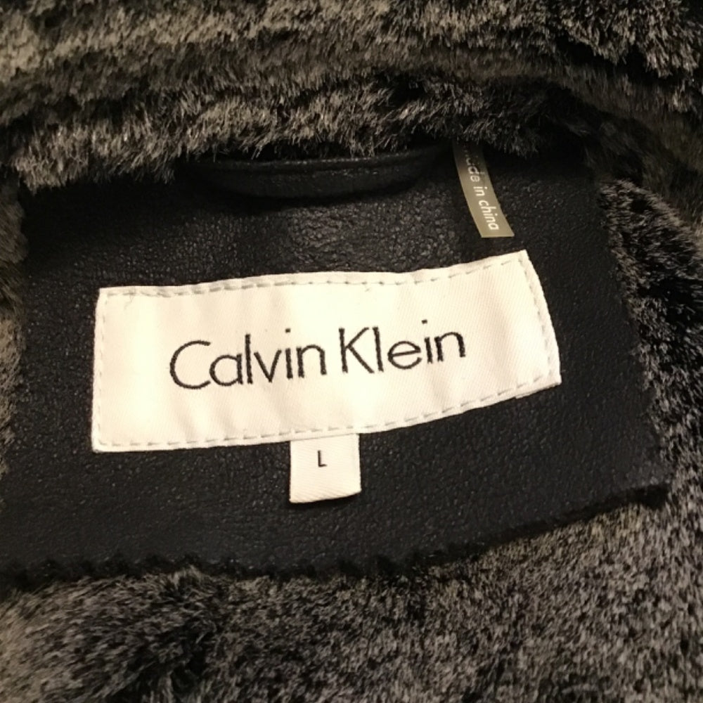 Never worn Calvin Klein black Jacket leather faux Fur size L