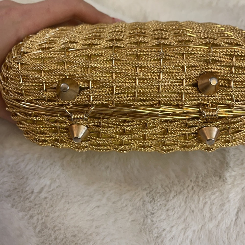 Vintage 80s Gold metal clutch with feet metallic