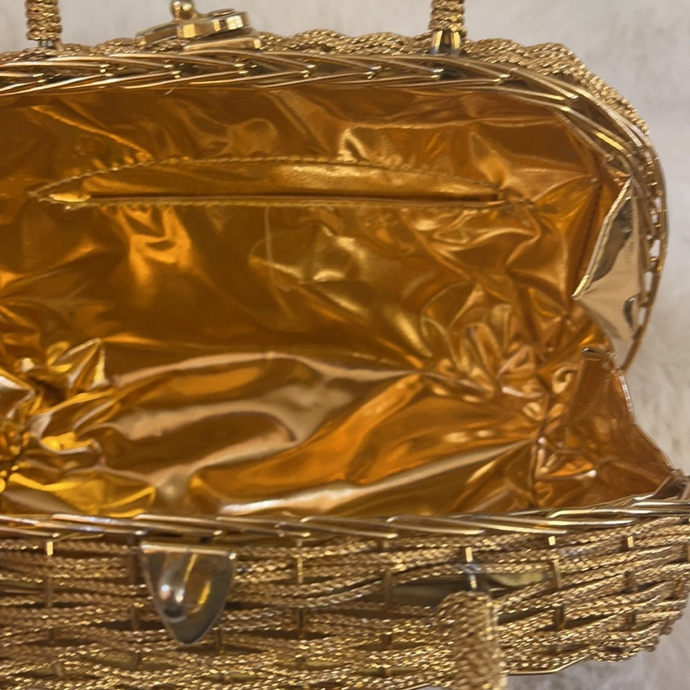 Vintage 80s Gold metal clutch with feet metallic