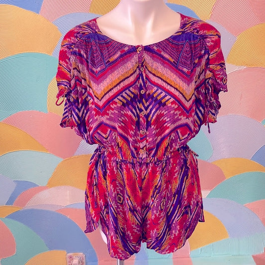 Free people romper Exotic print size M
