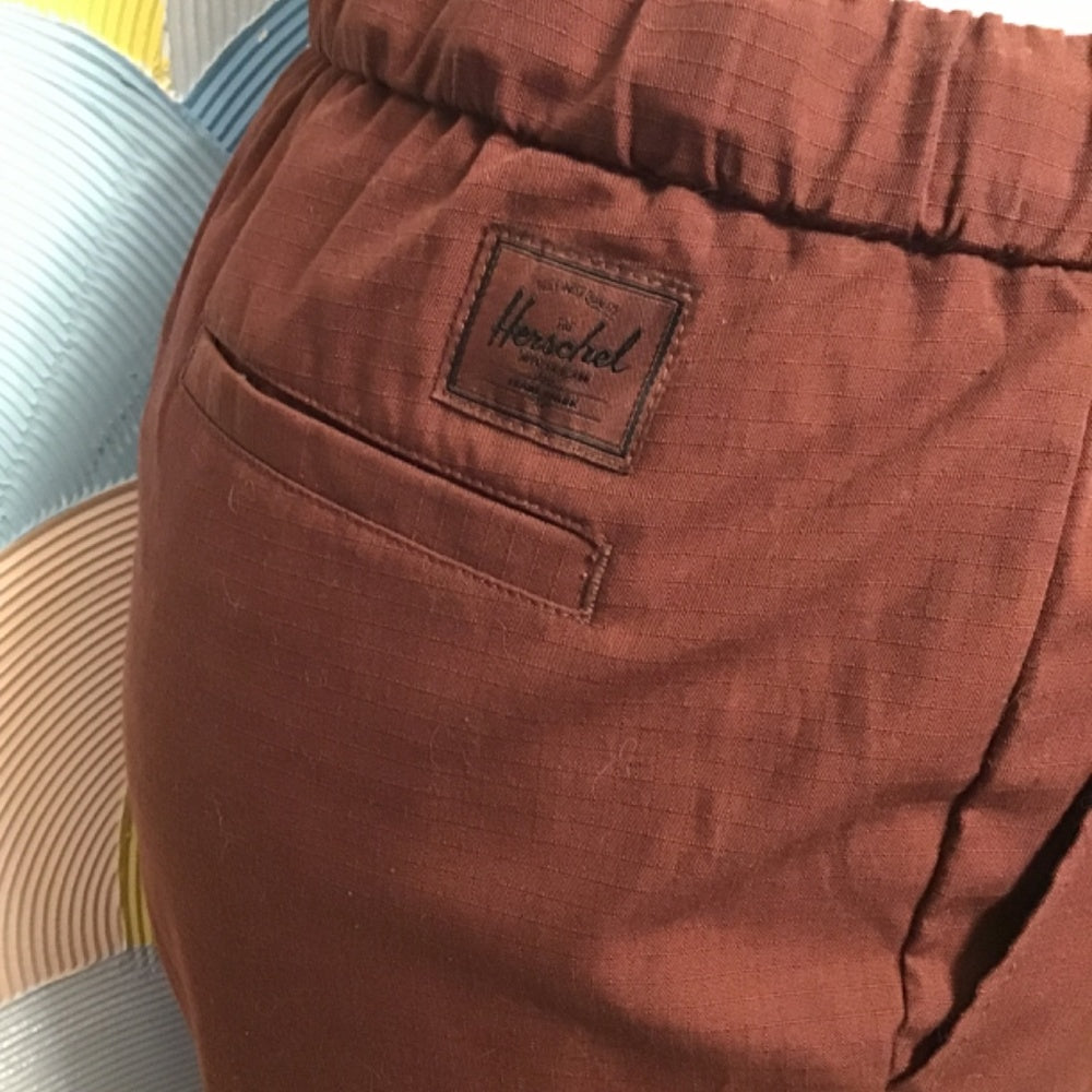 Herschel maroon long pants with adjustable waist band size small