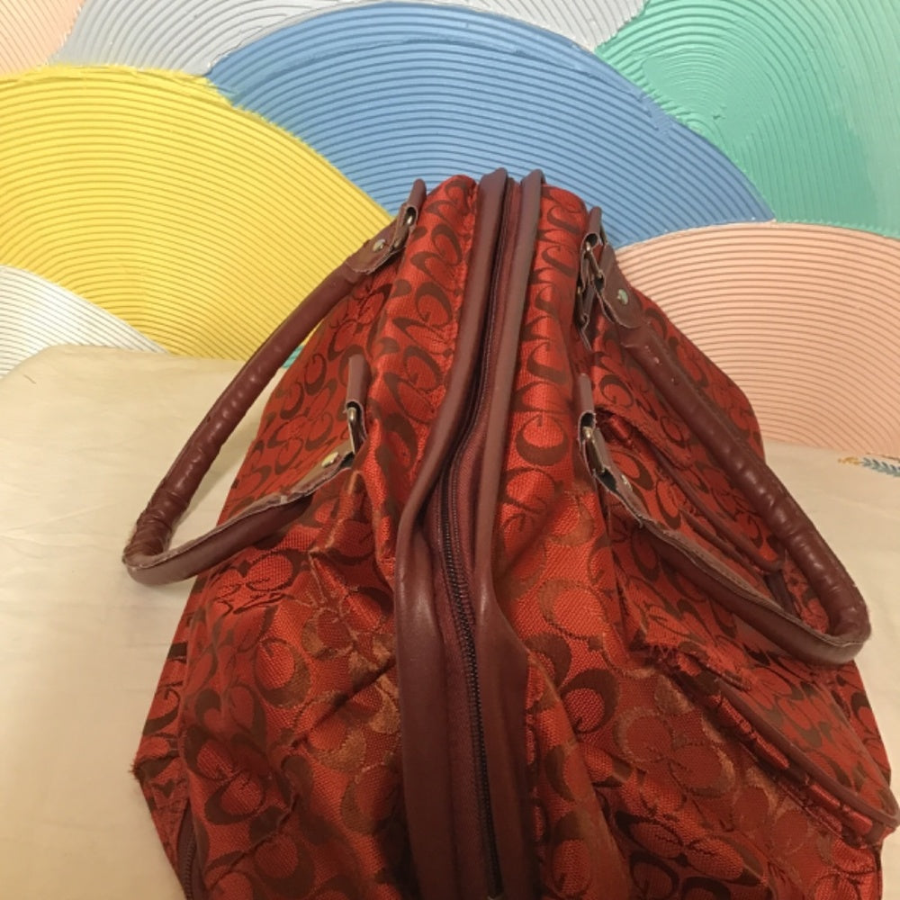 China town G travel bag red and maroon.