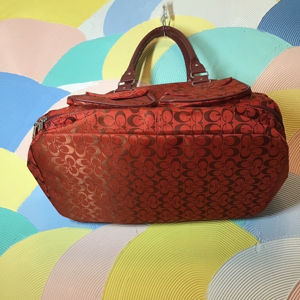 China town G travel bag red and maroon.