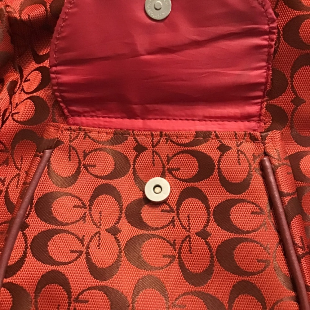 China town G travel bag red and maroon.