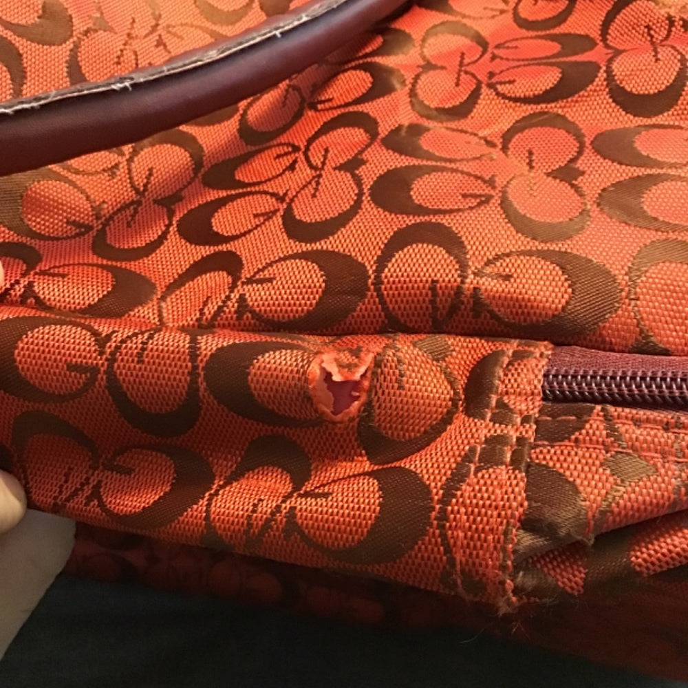China town G travel bag red and maroon.