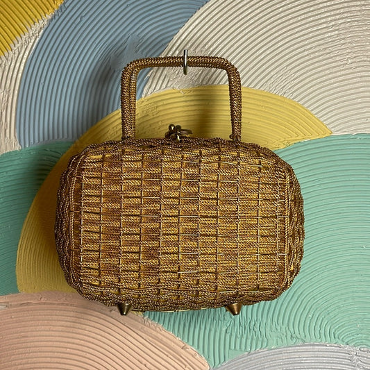 Vintage 80s Gold metal clutch with feet metallic