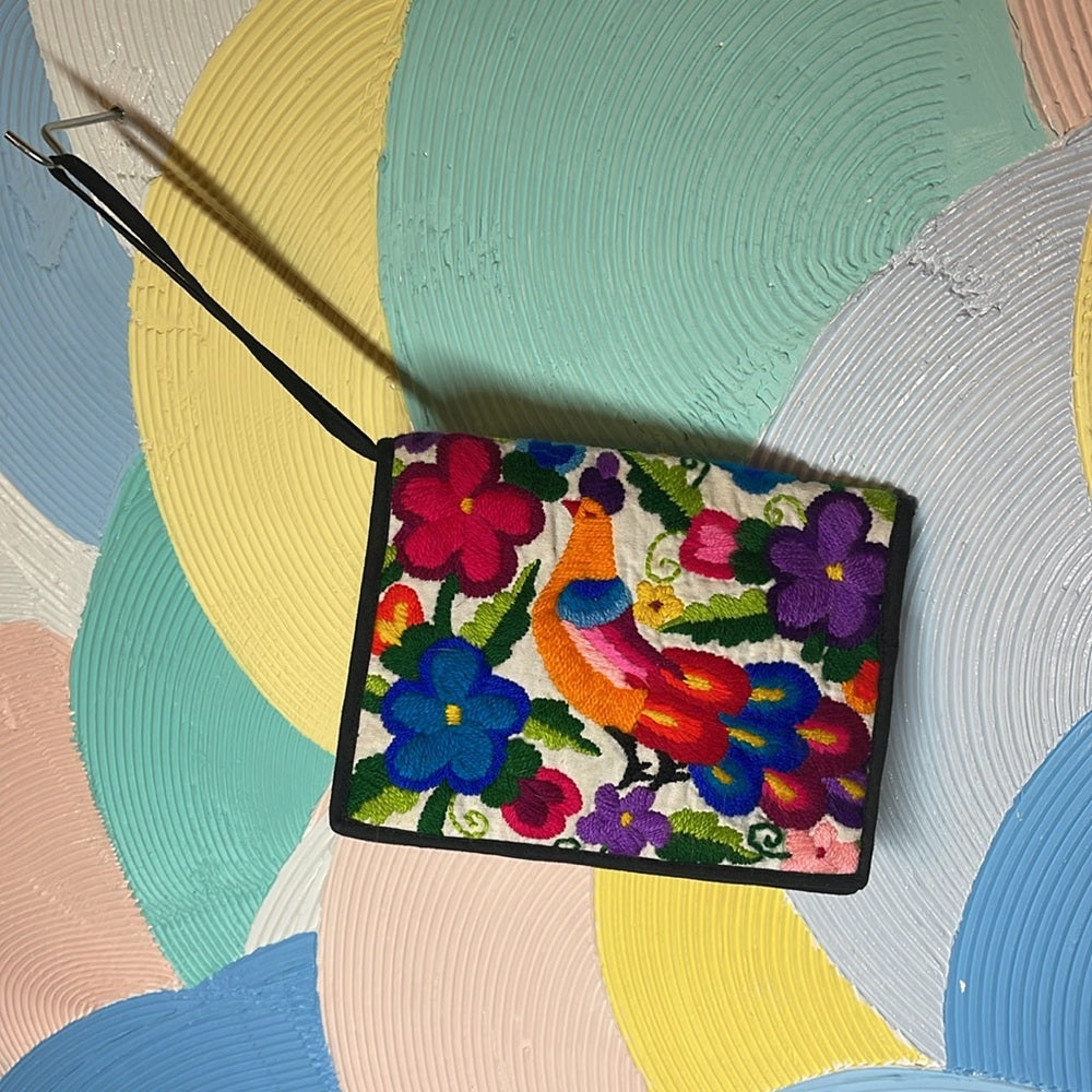 Embroidered passport holder with Velcro and multiple zippers featuring Peacock