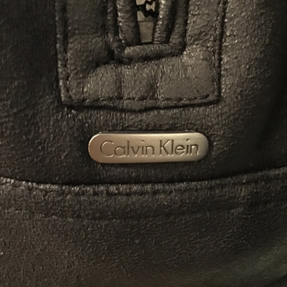 Never worn Calvin Klein black Jacket leather faux Fur size L
