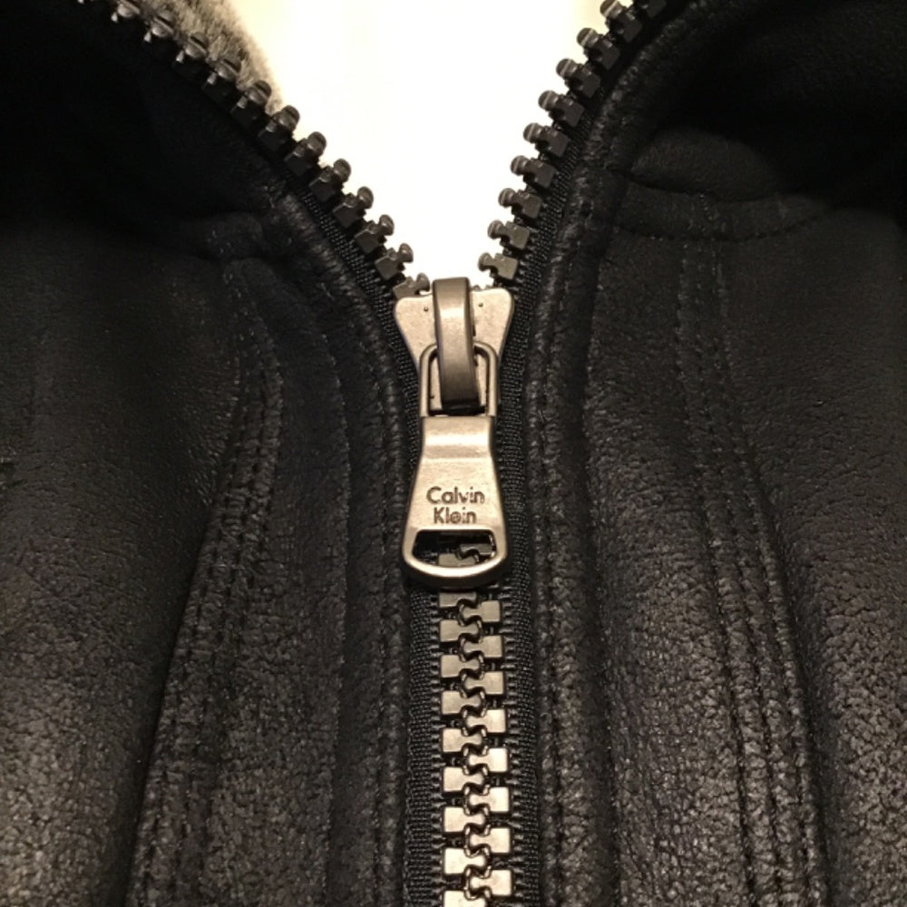 Never worn Calvin Klein black Jacket leather faux Fur size L